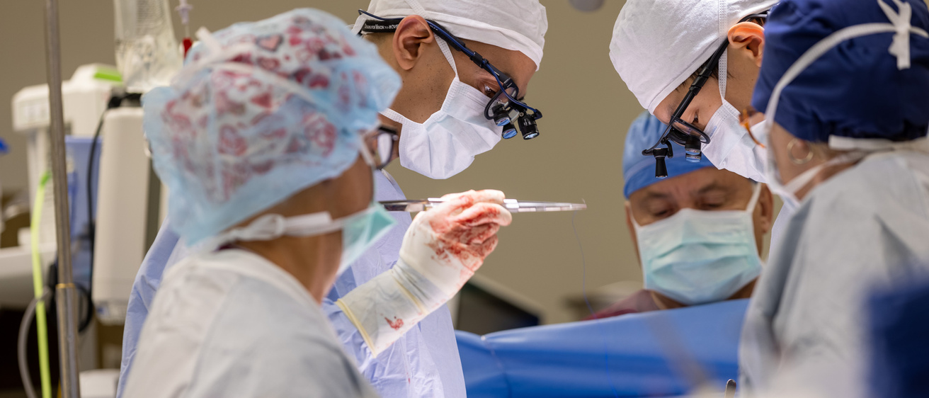 Mohammad Bashir and thoracic surgery fellow Albert Pai perform a pulmonary/tricuspid valve repair/replacement at UIHC on Friday, Oct. 22, 2021.